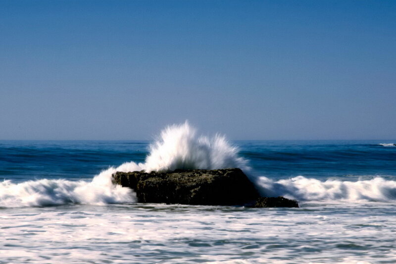 Wave crashing on rock