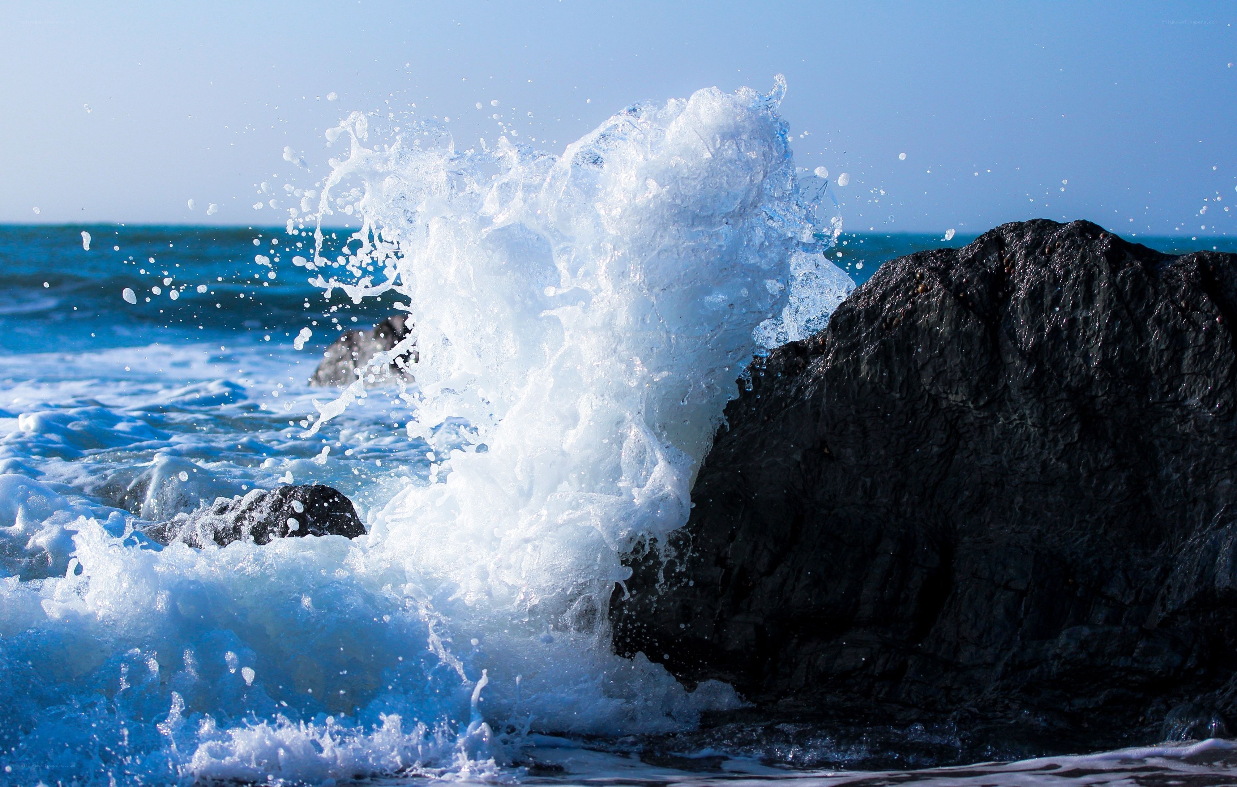 Wave crashing on rocks