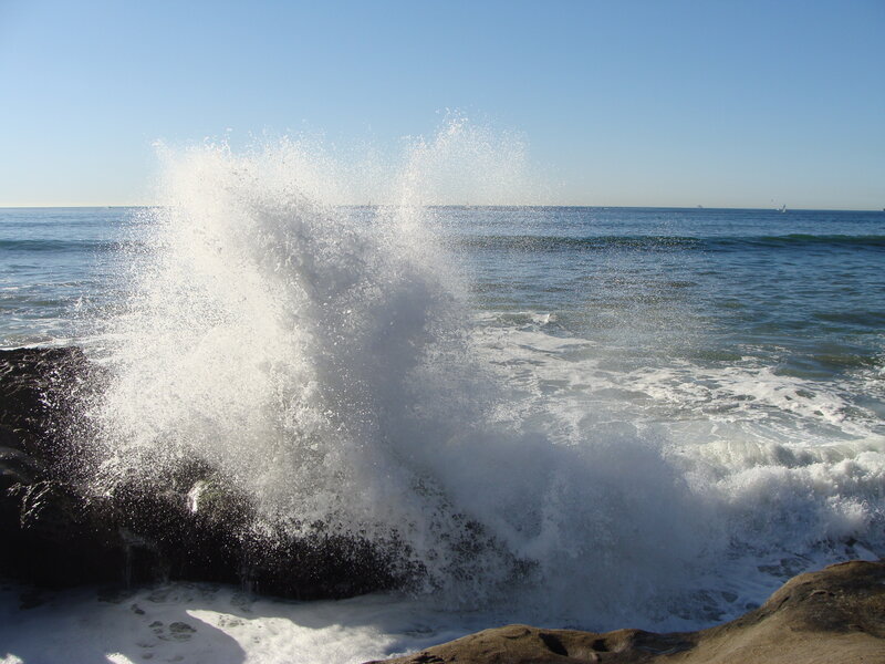 Wave crashing on rocks