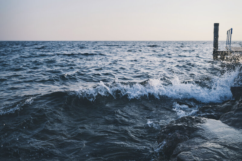 Wave Crashing on Rocks — Blue, Calm