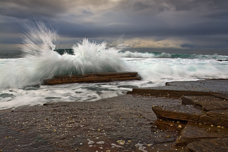 Wave Crashing on Rocks — Gray