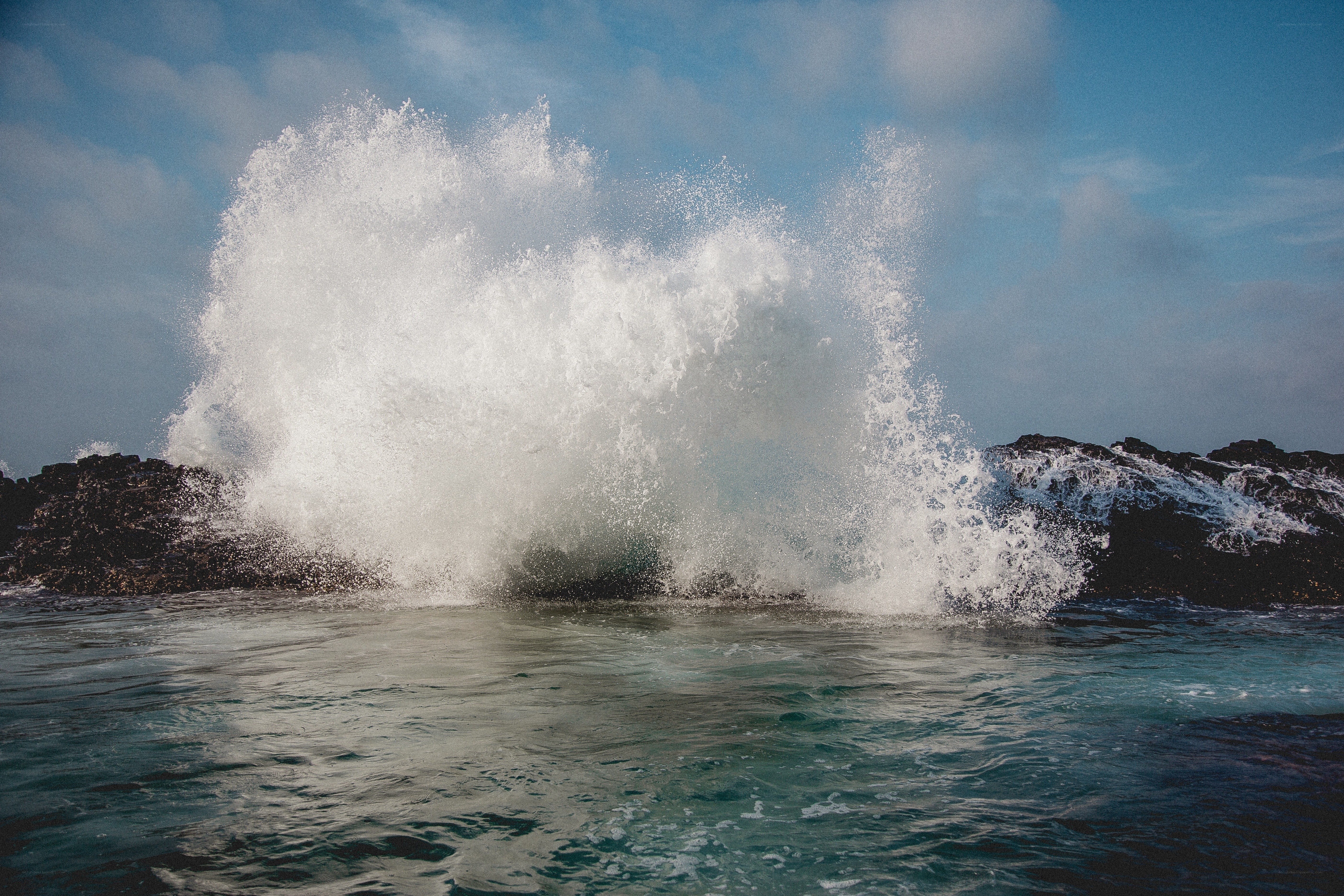 Wave crashing on rocks