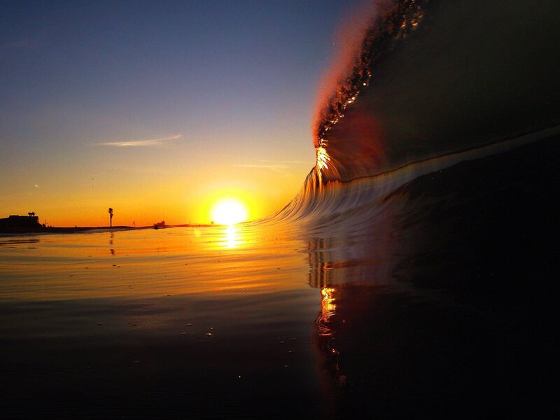 Wave Curling at Sunset — Orange, Dramatic