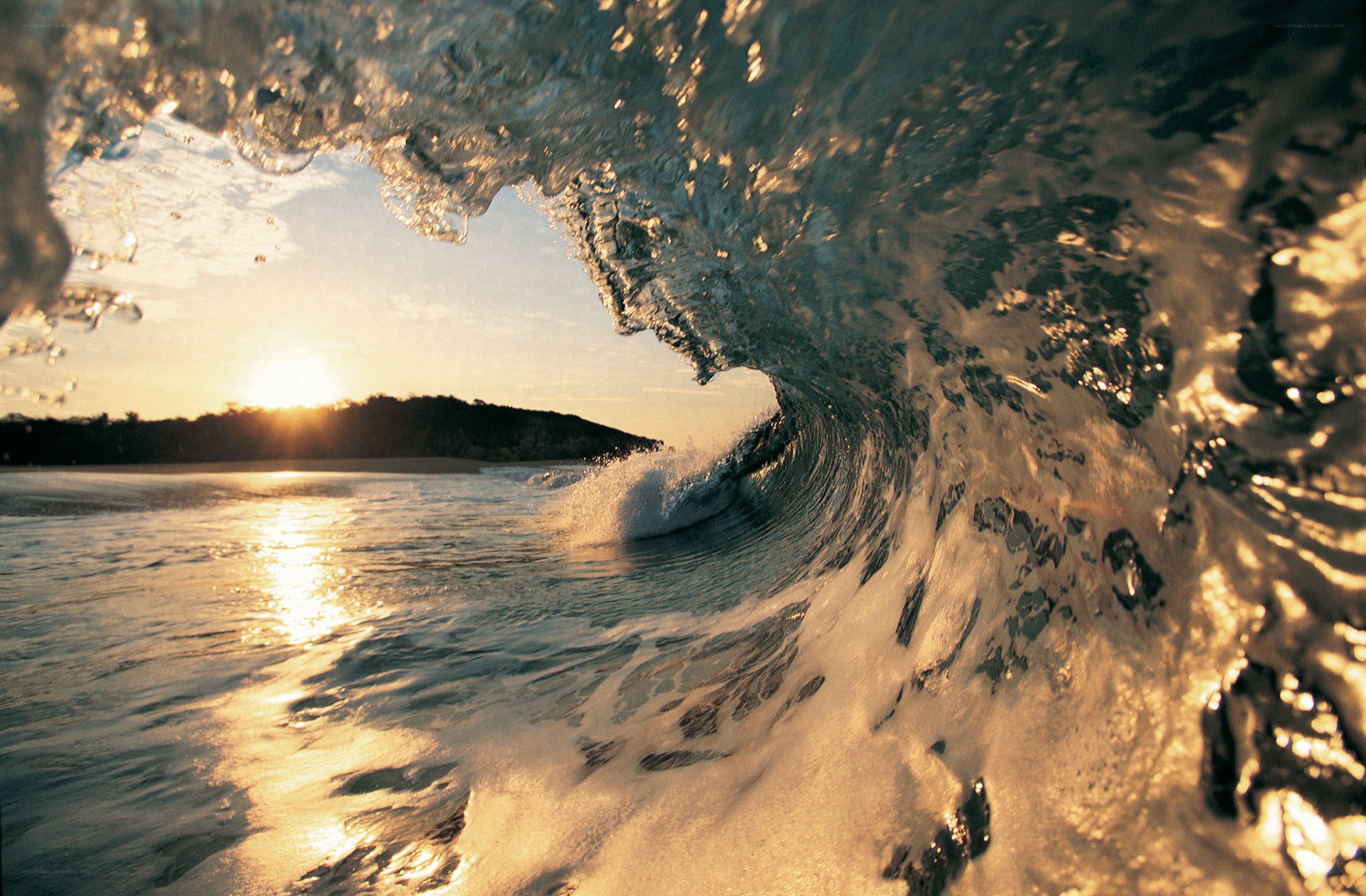 Wave tunnel at sunset