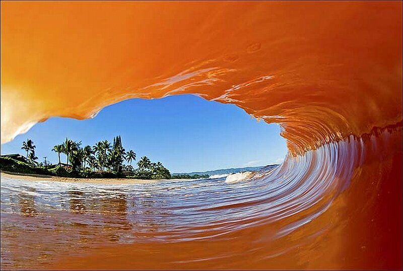 Wave tunnel view of tropical beach