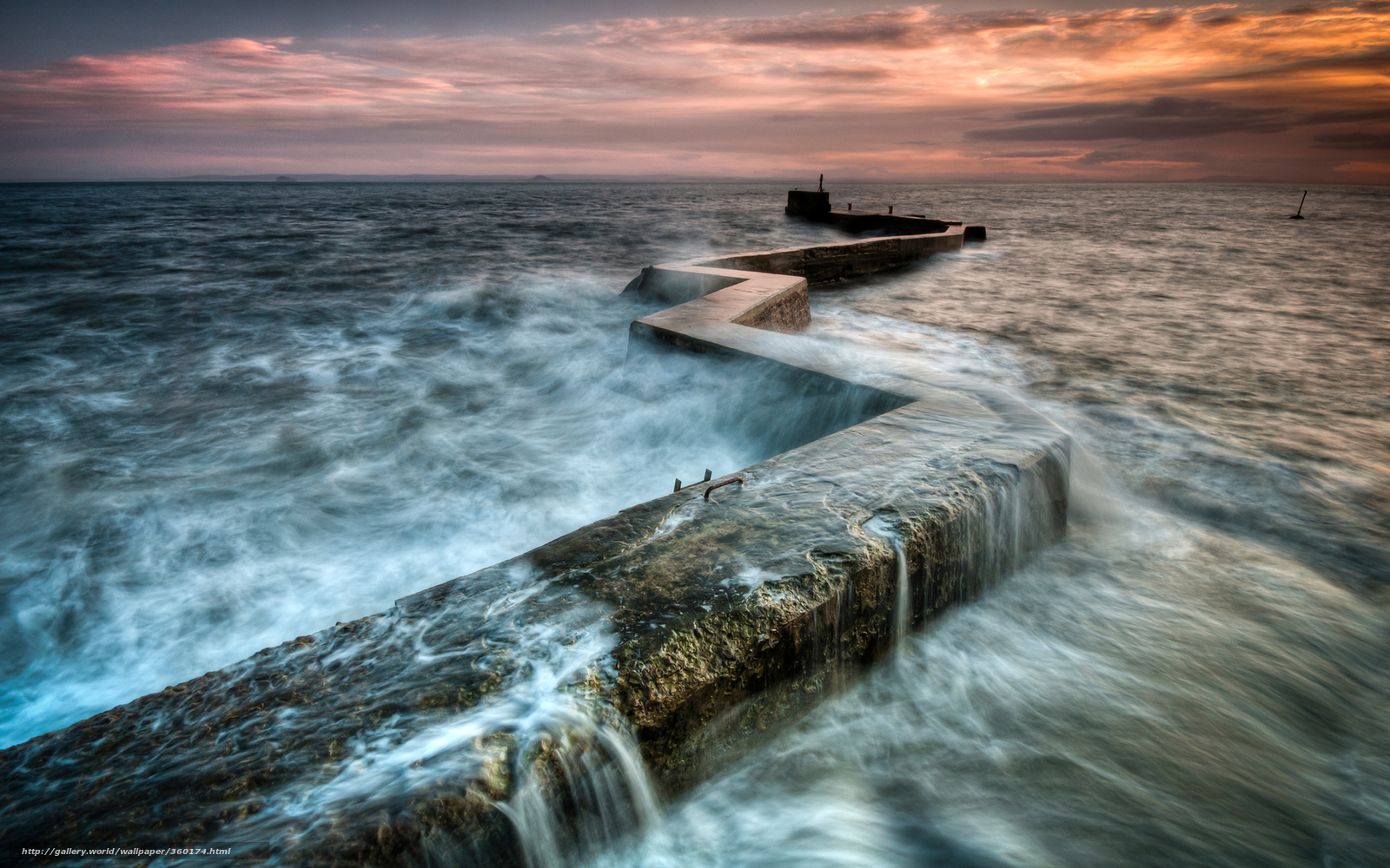 Waves at a Pier at Sunset