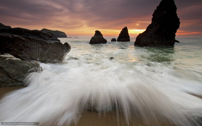 Waves at Sunset on a Rocky Shore