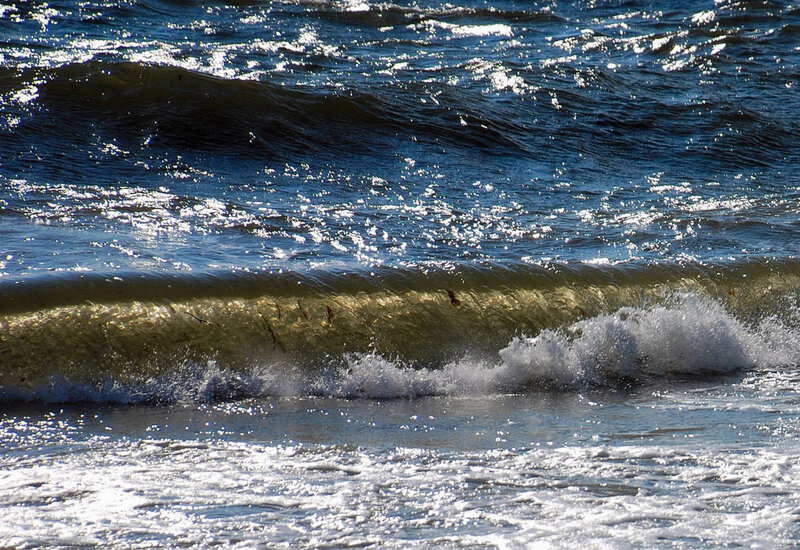 Waves breaking on the shore