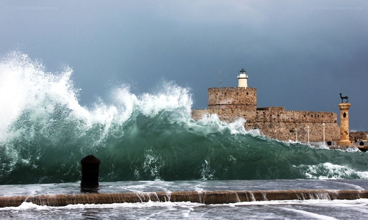 Waves crashing at a fortress