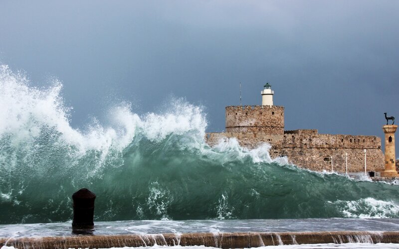 Waves crashing at a historic fortress