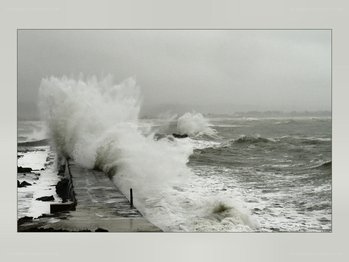 Waves crashing on a pier