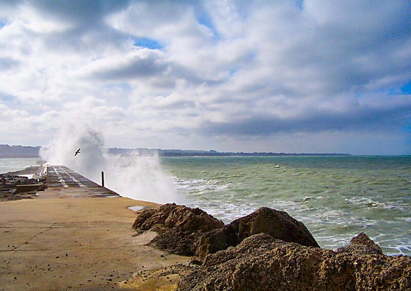 Waves crashing on a pier