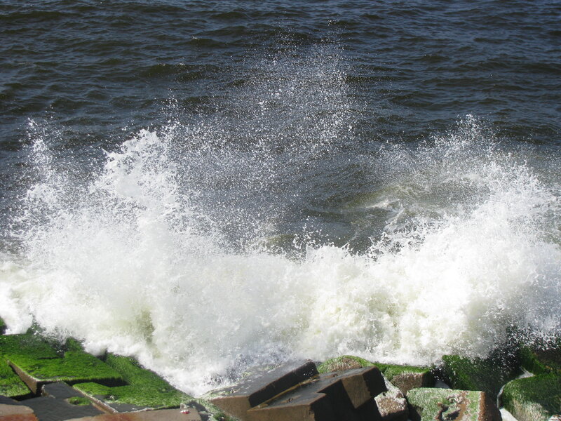 Waves crashing on a seawall