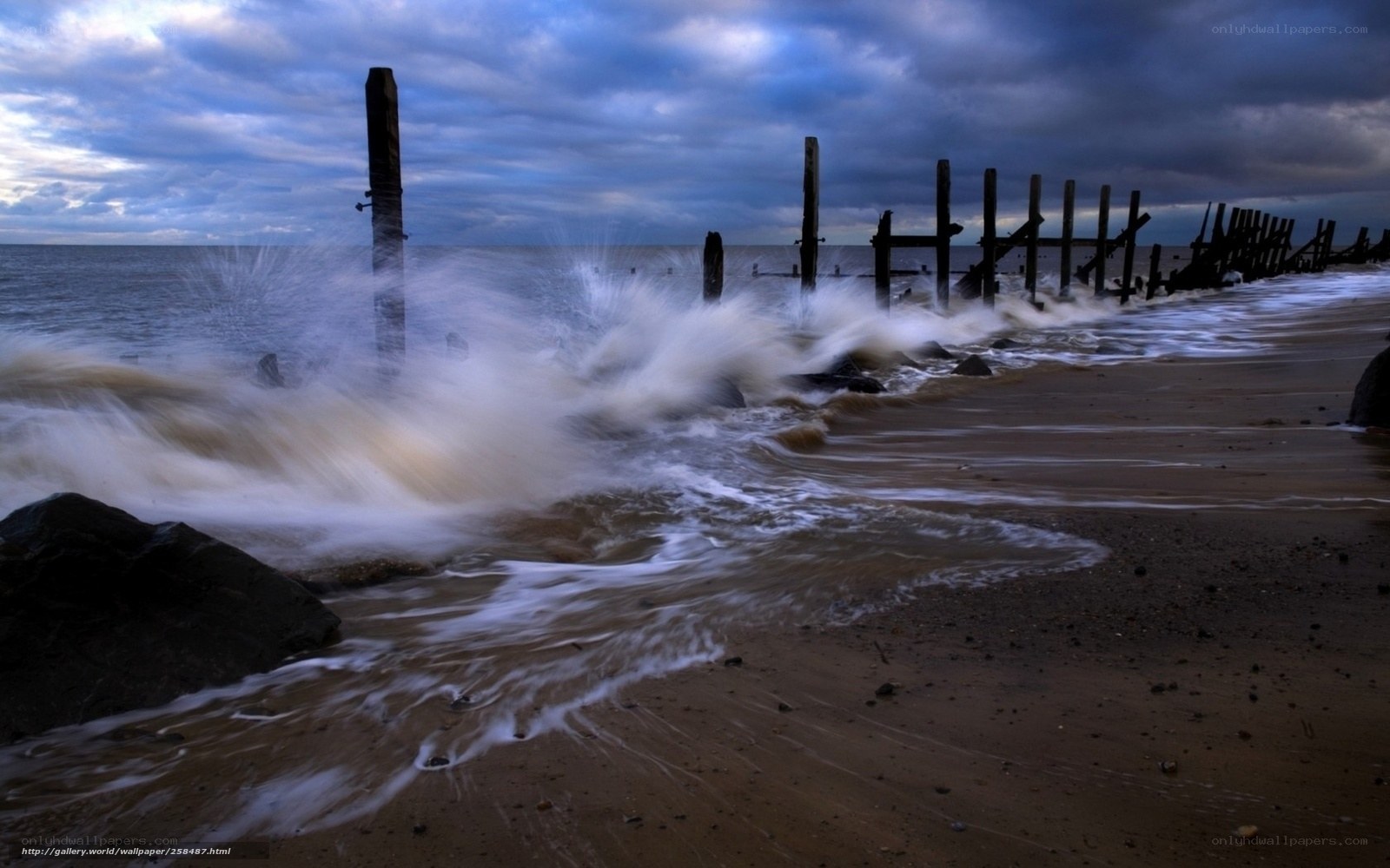 Waves crashing on a stormy beach