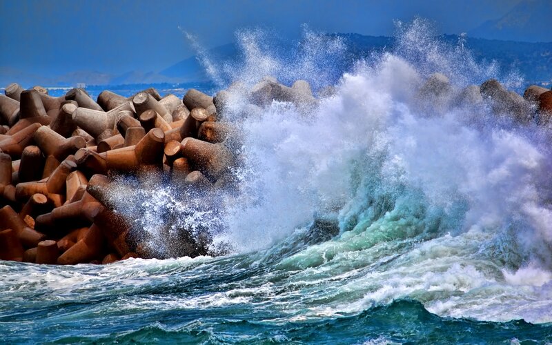 Waves Crashing on Breakwater