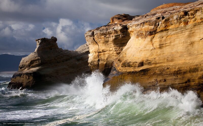 Waves crashing on coastal cliffs