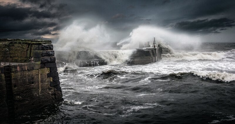 Waves Crashing on Harbor Wall