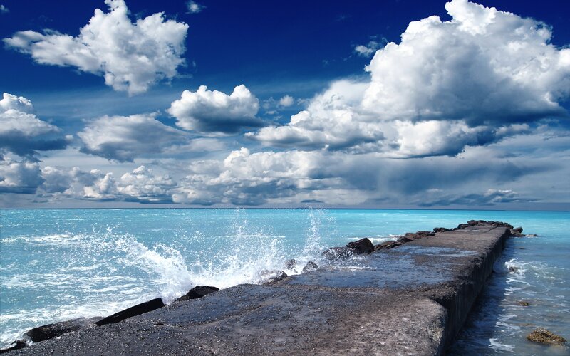 Waves Crashing on Pier — Afternoon