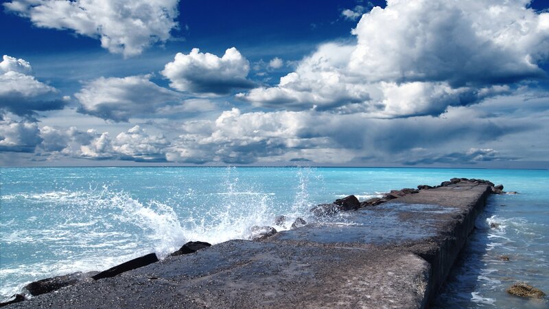 Waves Crashing on Pier — Blue, Dramatic