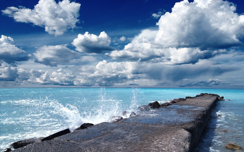 Waves Crashing on Pier — Dramatic