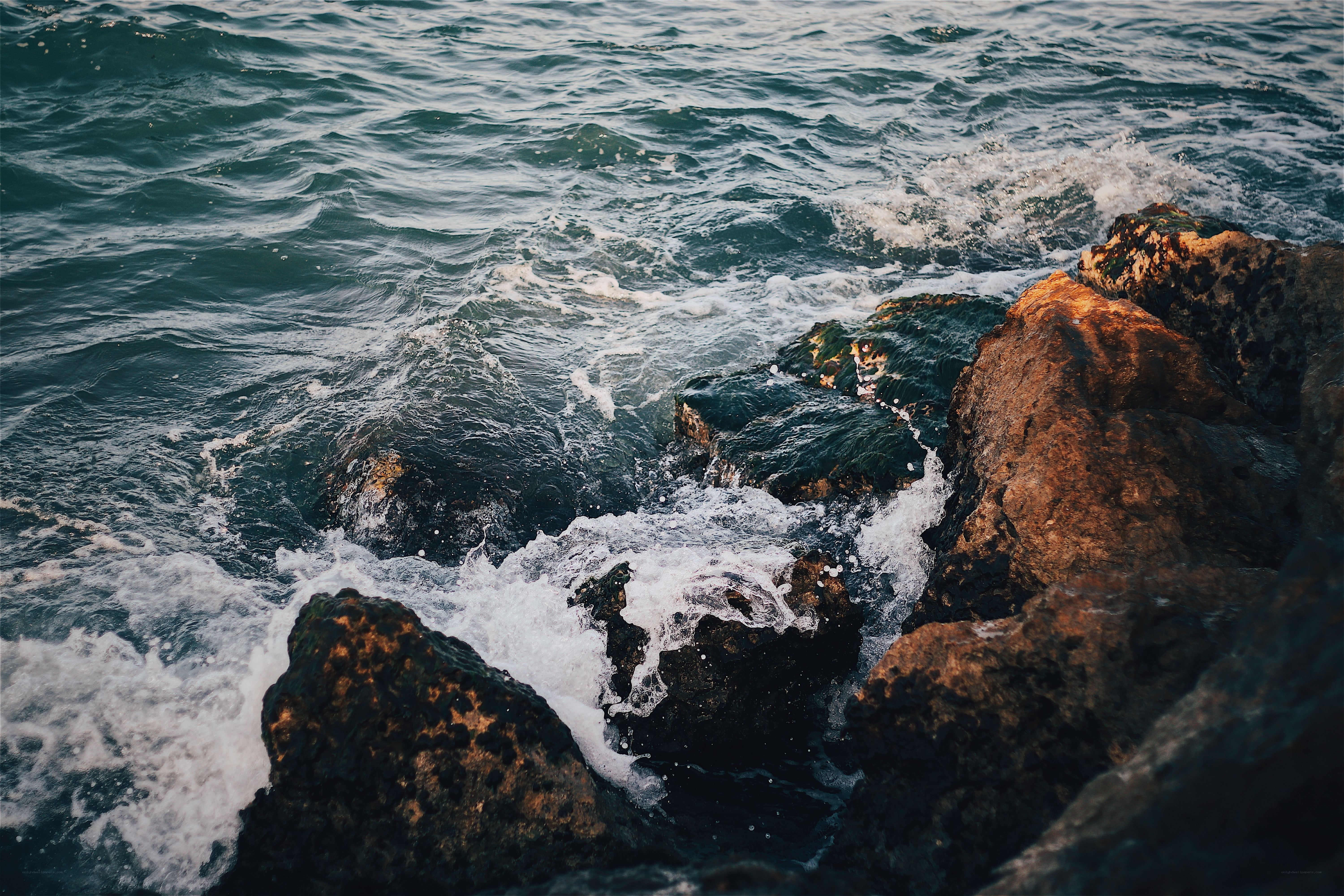 Waves crashing on rocks