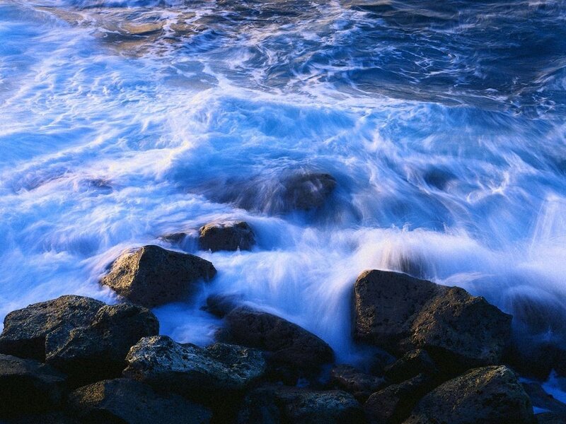 Waves crashing on rocks