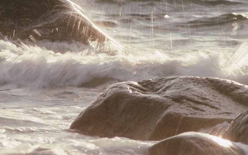 Waves crashing on rocks