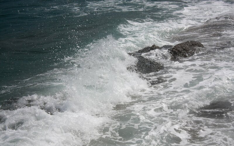 Waves crashing on rocks