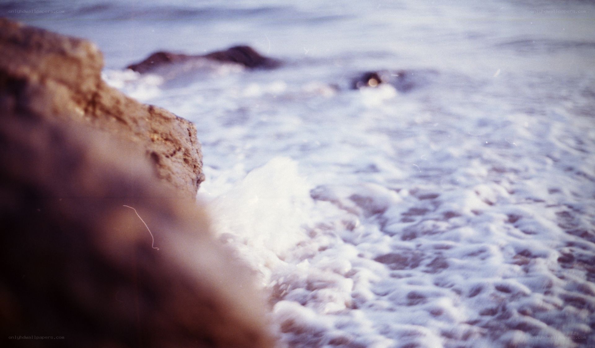 waves crashing on rocks
