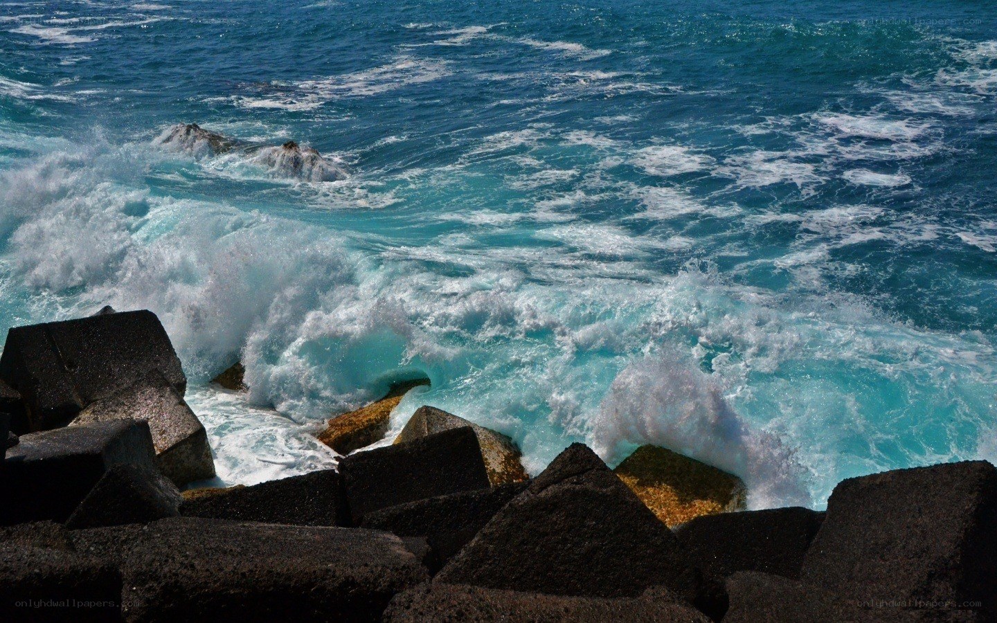 Waves crashing on rocks