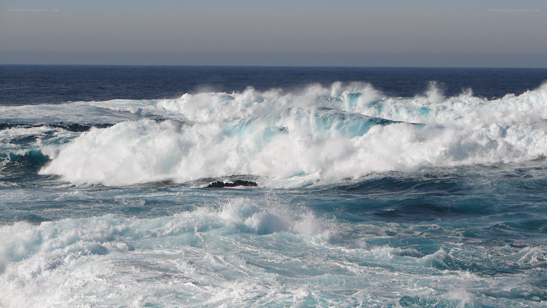 Waves crashing on rocks