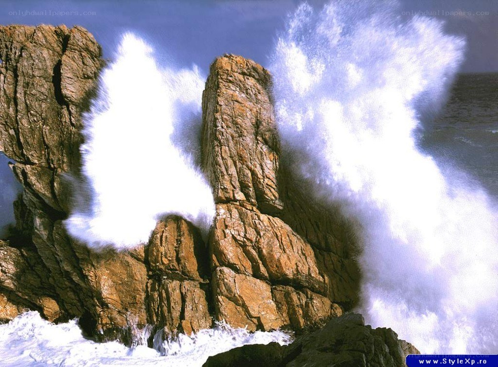 Waves crashing on rocks
