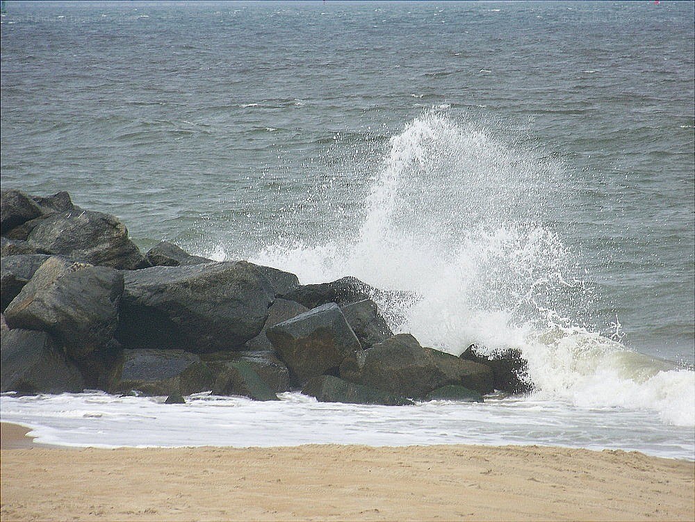 Waves crashing on rocks