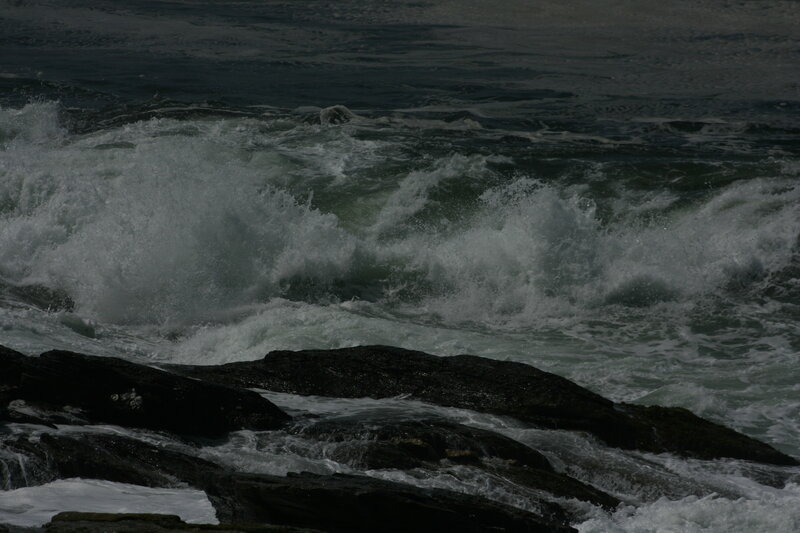 Waves crashing on rocks