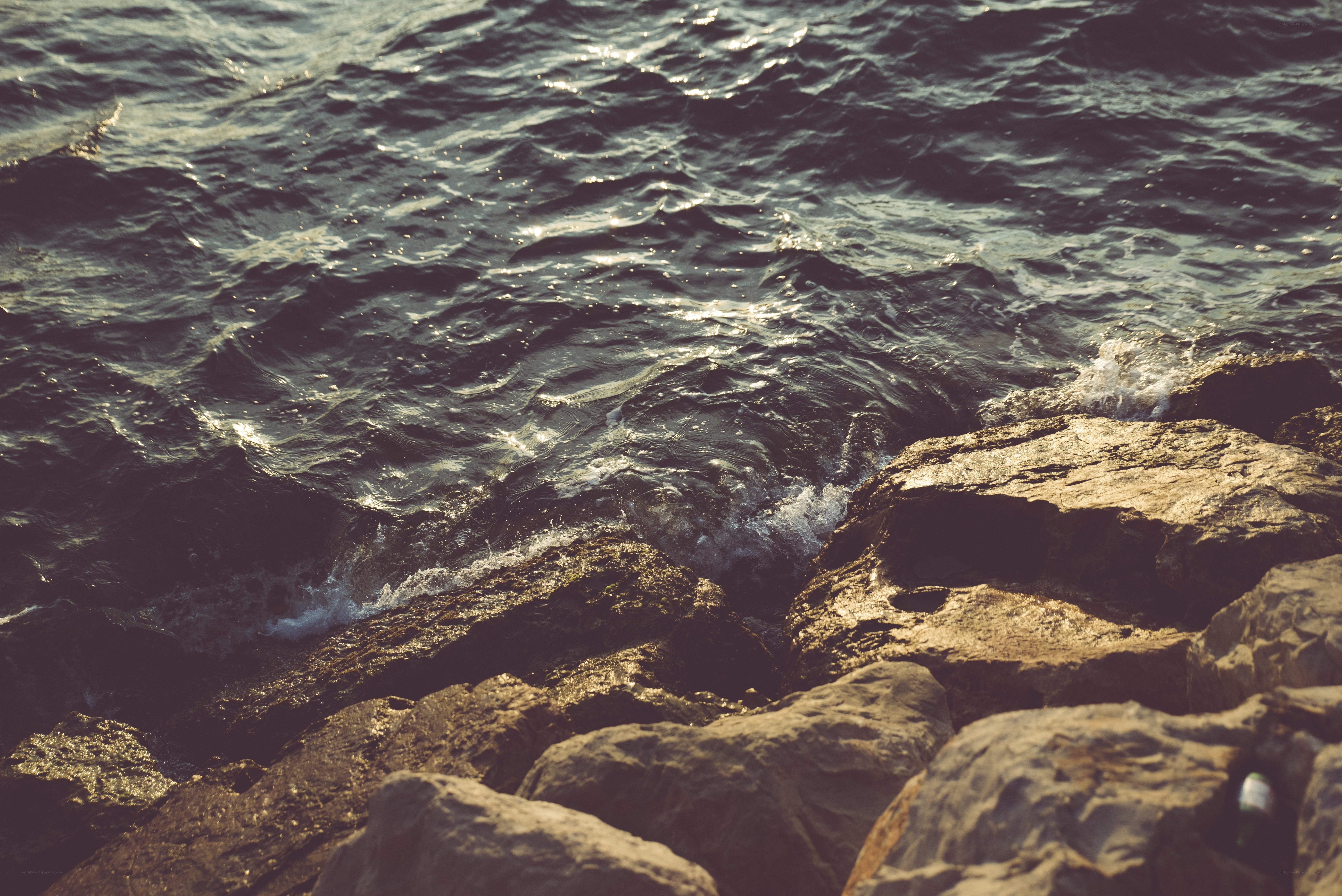 Waves crashing on rocks