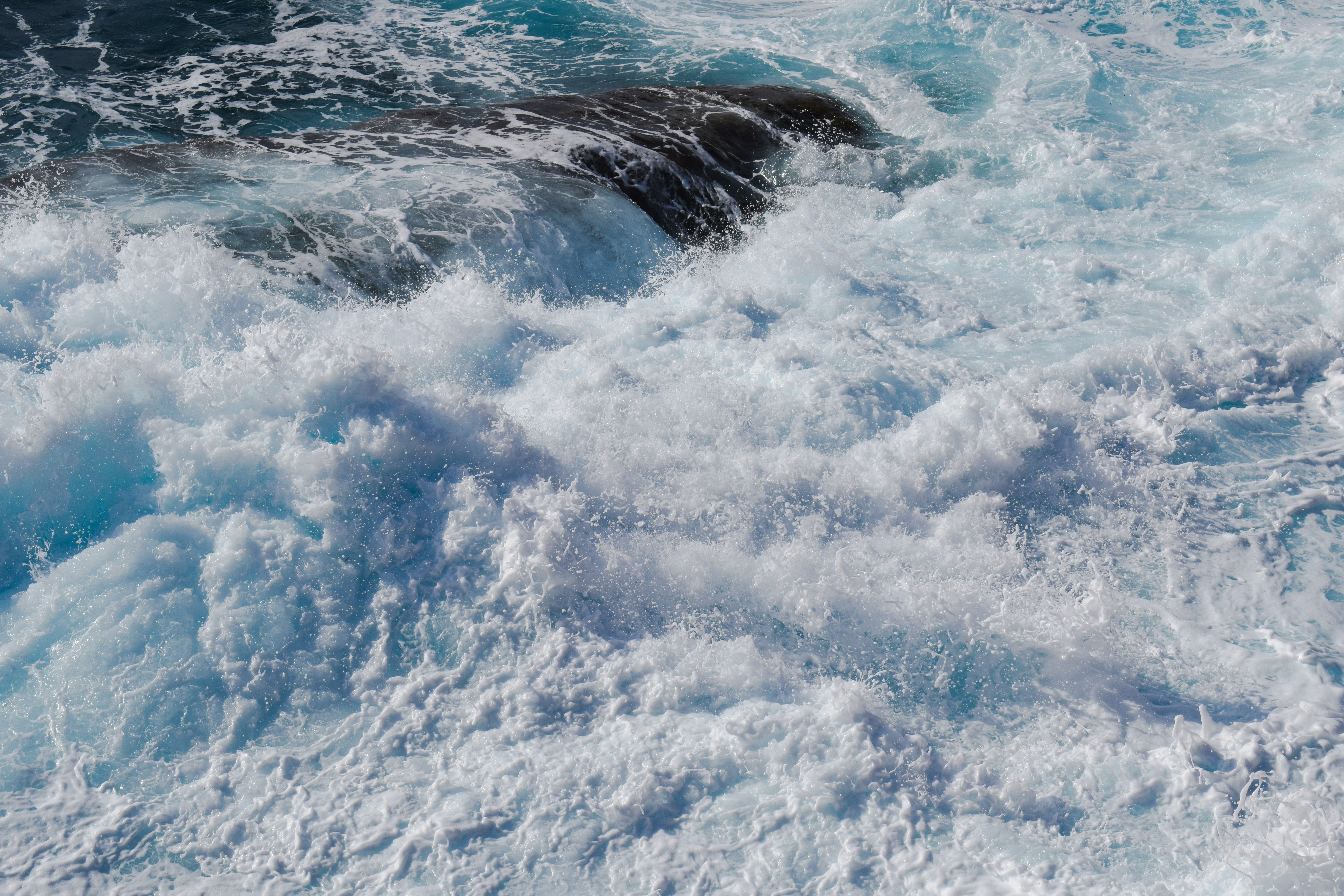 Waves crashing on rocks