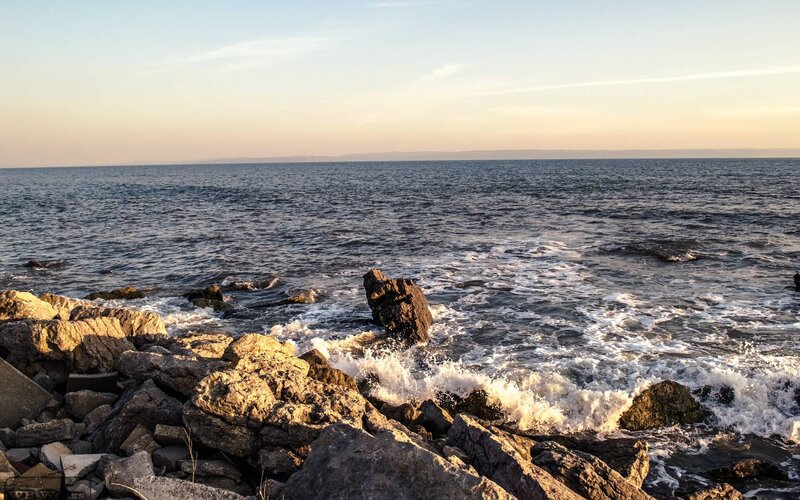 Waves Crashing on Rocks — Blue, Calm, Sunset