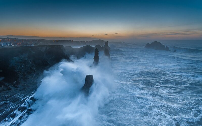 Waves Crashing on Rocks — Blue, Dramatic, Sunset, Photograph, Ocean, Cliffs, Town
