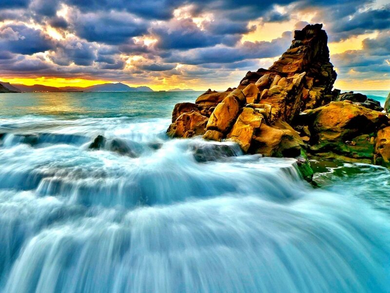 Waves Crashing on Rocks — Blue, Dramatic, Sunset, Photograph, Ocean, Sky, Mountains