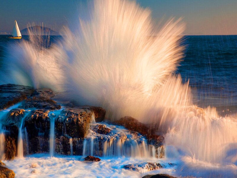 Waves Crashing on Rocks — Blue, Dramatic, Sunset, Photograph, Sailboat