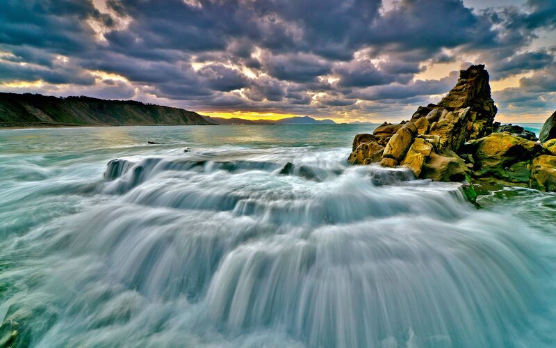Waves Crashing on Rocks — Blue, Dramatic, Sunset, Photograph, Sea, Clouds