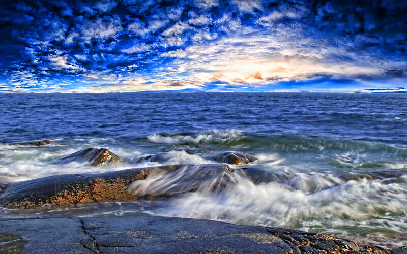 Waves Crashing on Rocks — Blue, Dramatic, Sunset