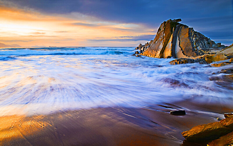 Waves Crashing on Rocks — Blue, Sand