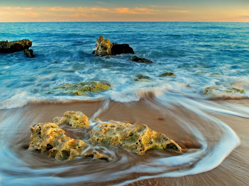Waves Crashing on Rocks — Blue, Serene, Sunset, Photograph, Ocean, Sand, Sky