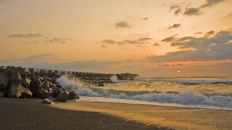 Waves Crashing on Rocks — Orange, Serene