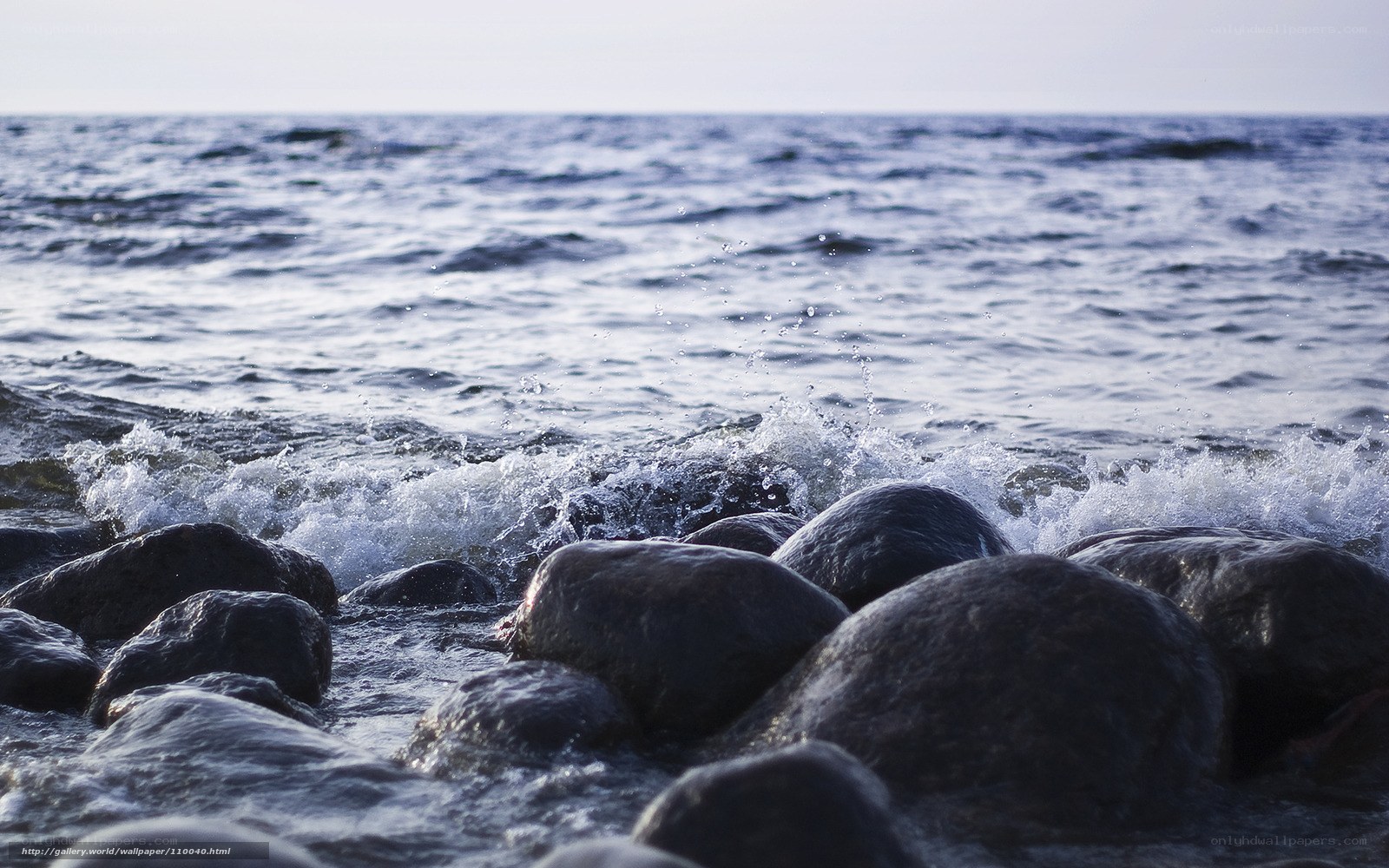 Waves crashing on rocks
