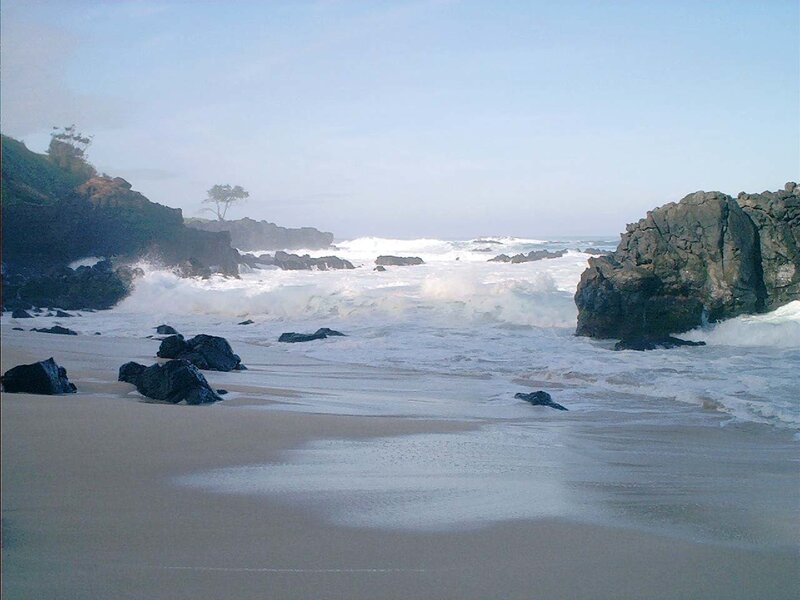Waves Crashing on Rocky Beach — Blue, Calm, Morning