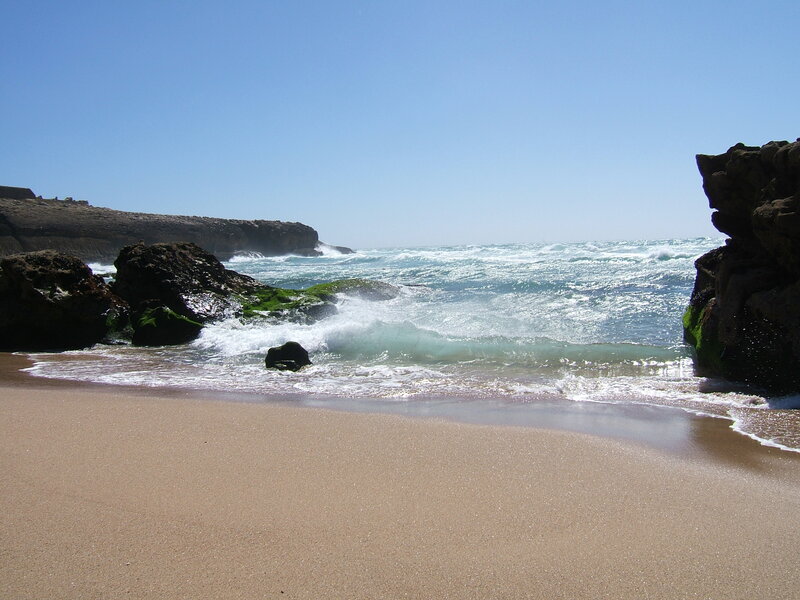 Waves Crashing on Rocky Beach — Blue, Calm