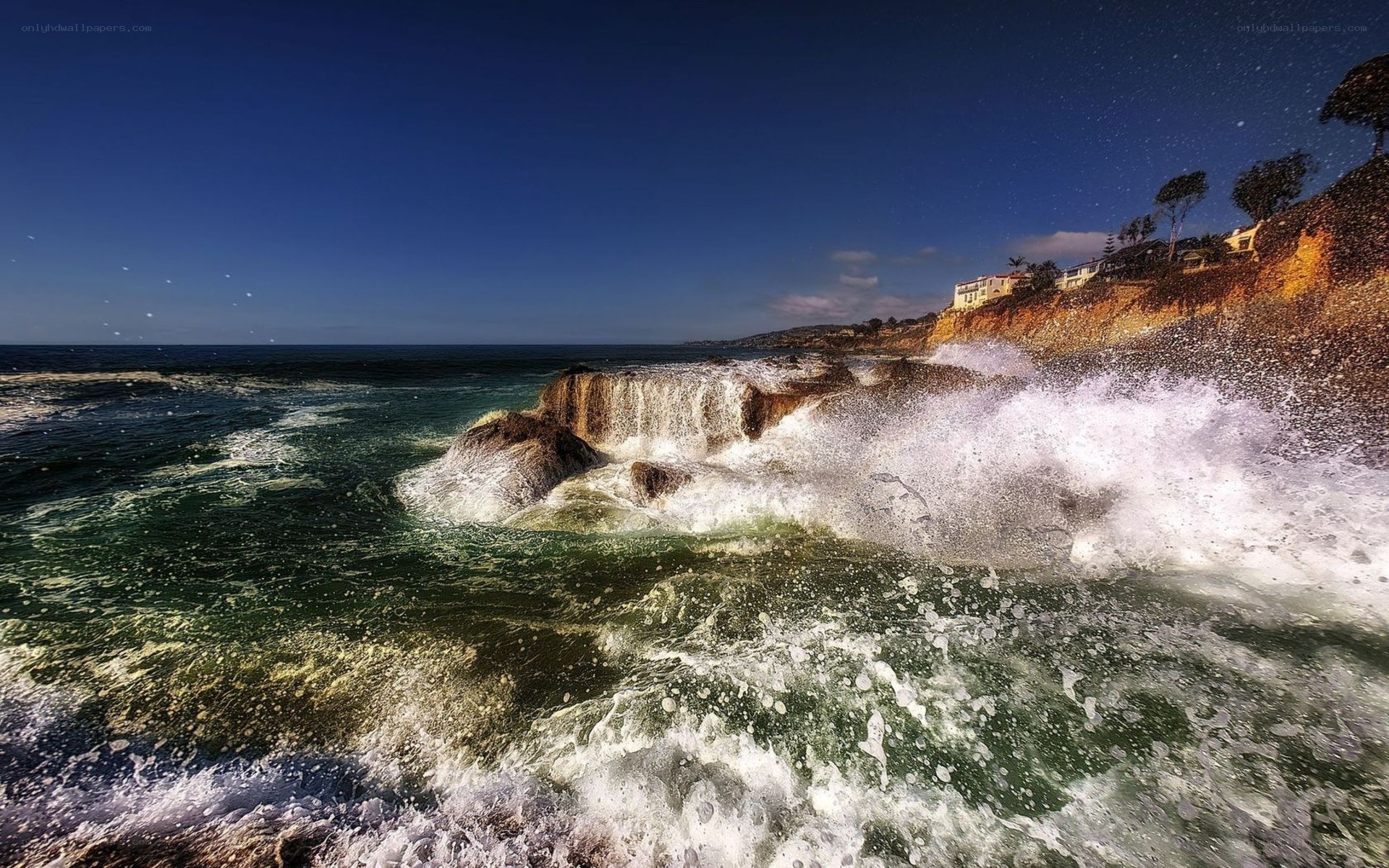 Waves crashing on rocky coast