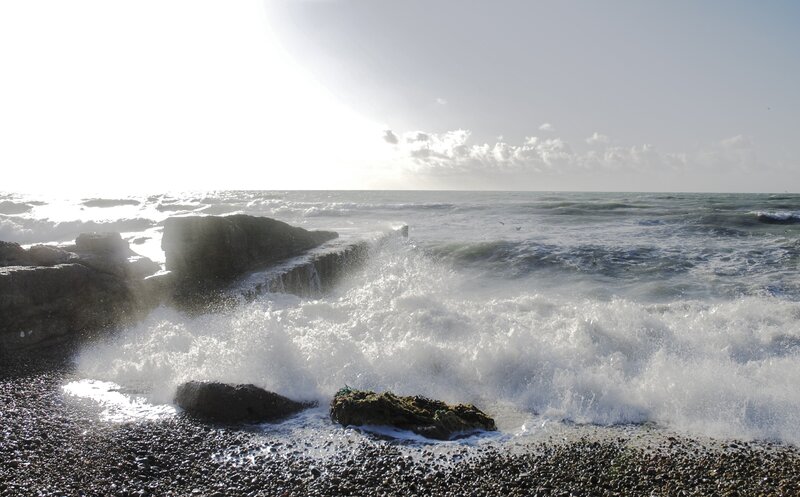 Waves crashing on rocky shore
